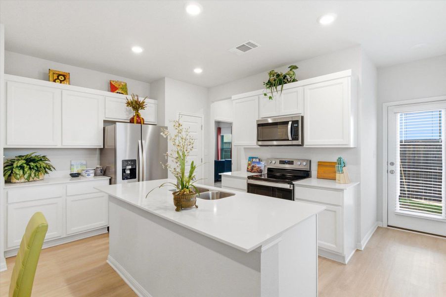 Lots of cabinetry and a step in pantry