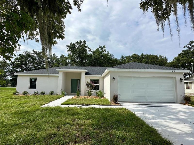 Front exterior of a new home in , Lakeland, FL, highlighting curb appeal (Image 2). Front exterior of a new home in , Lakeland, FL, highlighting curb appeal (Image 2).