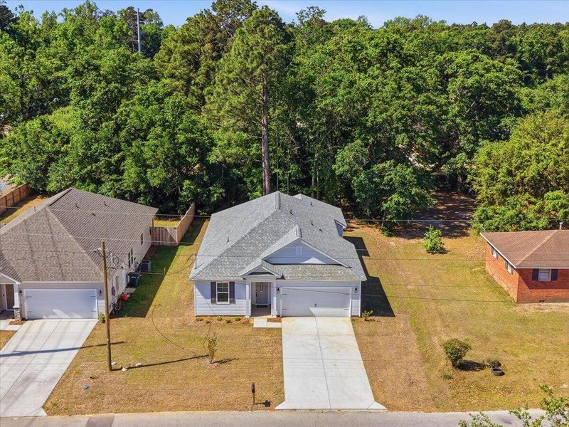 Front exterior of a new home in , Orangeburg, SC, highlighting curb appeal (Image 26).
