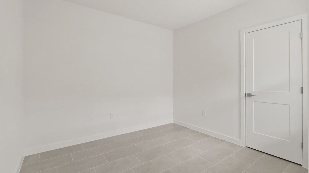 Furnished interior view inside a new home in Grasslands West, Lakeland (Image 20).