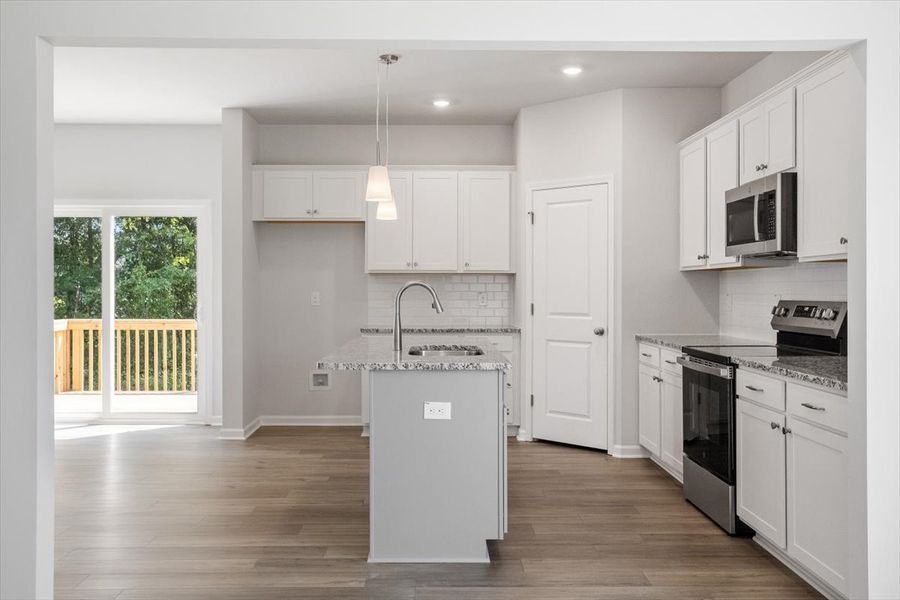 Furnished interior view inside a new home in Cambridge Reserve, Angier (Image 7).