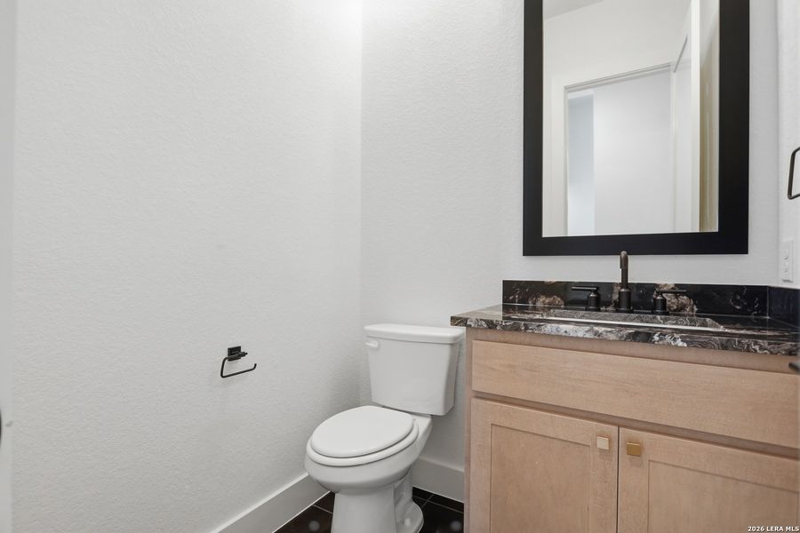 Furnished interior view inside a new home in Enchanted Bluff, San Antonio (Image 15).