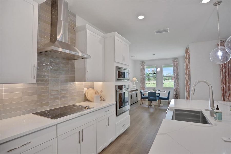 Furnished interior view inside a new home in Angeline, Land O' Lakes (Image 6).