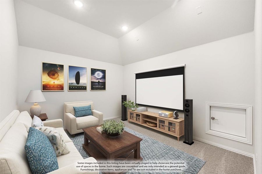Media room with projection screen, sofa, armchair, and movie posters on white walls Media room with projection screen, sofa, armchair, and movie posters on white walls