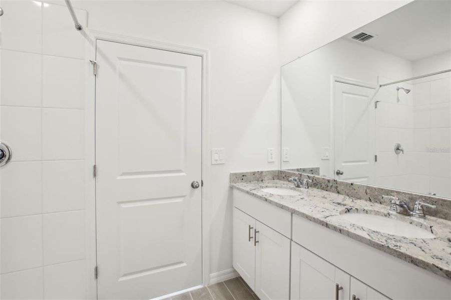 Furnished interior view inside a new home in Benton Hills - Classic Series, Brooksville (Image 8). Furnished interior view inside a new home in Benton Hills - Classic Series, Brooksville (Image 8).