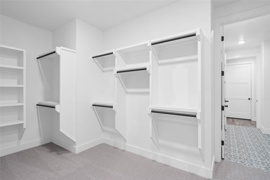 Furnished interior view inside a new home in ARTAVIA, Conroe (Image 9).