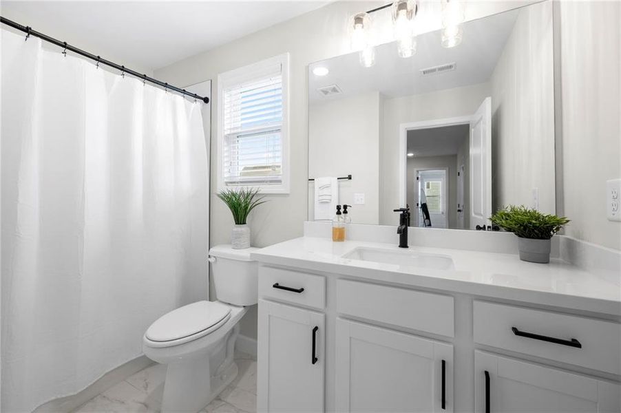 Furnished interior view inside a new home in Avenbrook, Mableton (Image 16).