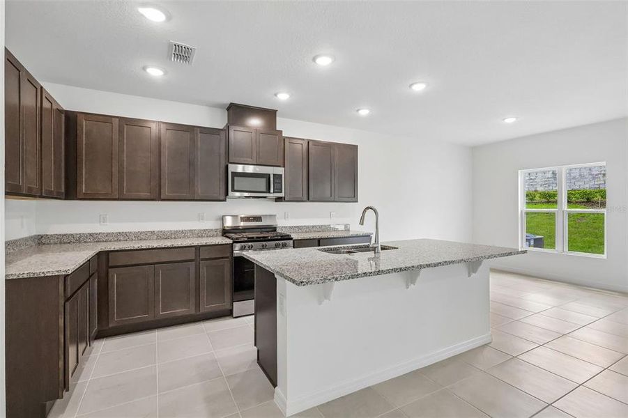 Furnished interior view inside a new home in Eagletail Landings, Howey-in-the-Hills (Image 5).