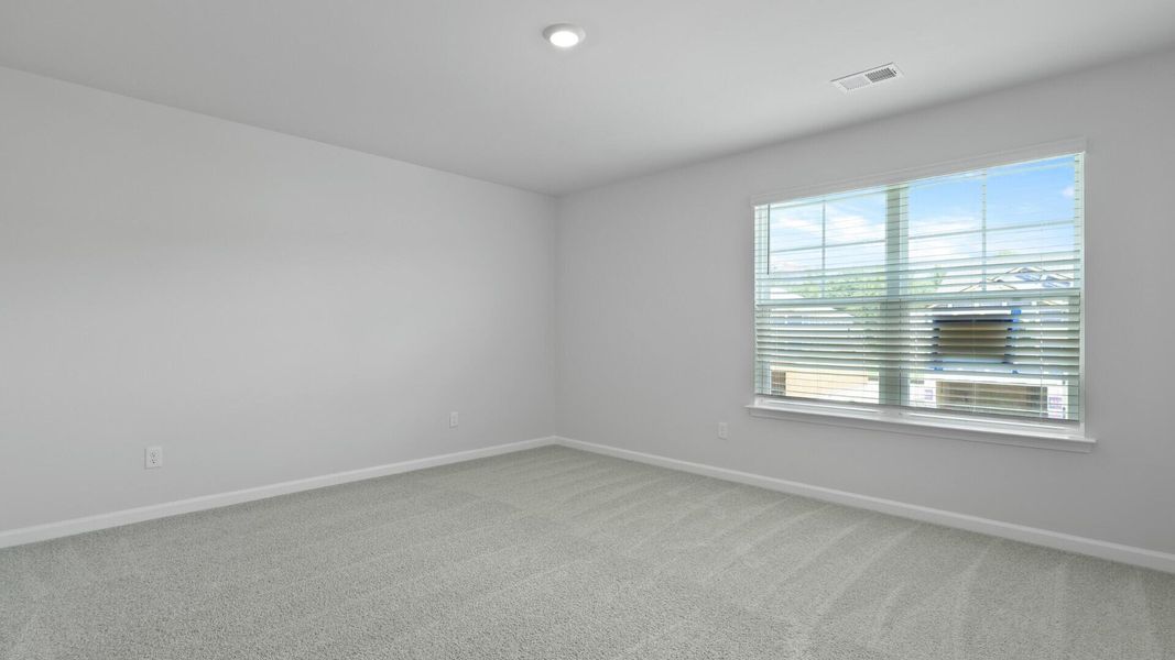 Spacious, unfurnished interior of a new home in Pine Hills at Cane Bay, Summerville (Image 20).