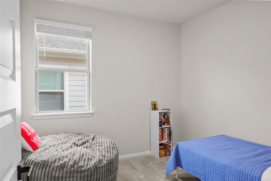 4th Bedroom featuring carpet and baseboards