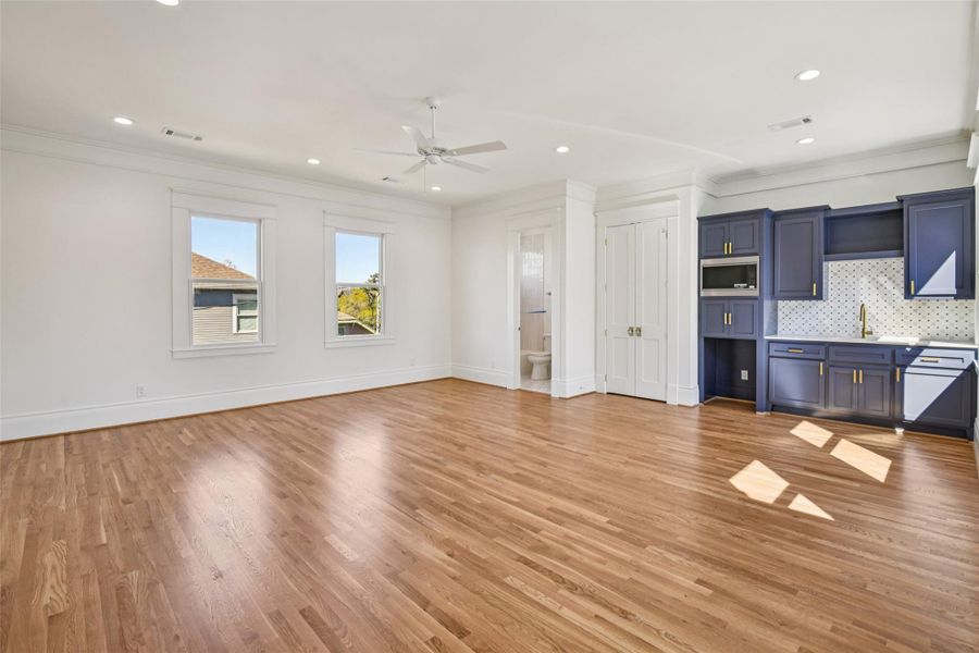 The attached quarters / full bath is set over the garage and spans the full space of the garage below. Featuring a kitchenette, full bath and a sizable closet, this space is perfect for a gym, secondary family room, children / teen playspace or a live-in nanny or parent. The attached quarters / full bath is set over the garage and spans the full space of the garage below. Featuring a kitchenette, full bath and a sizable closet, this space is perfect for a gym, secondary family room, children / teen playspace or a live-in nanny or parent.