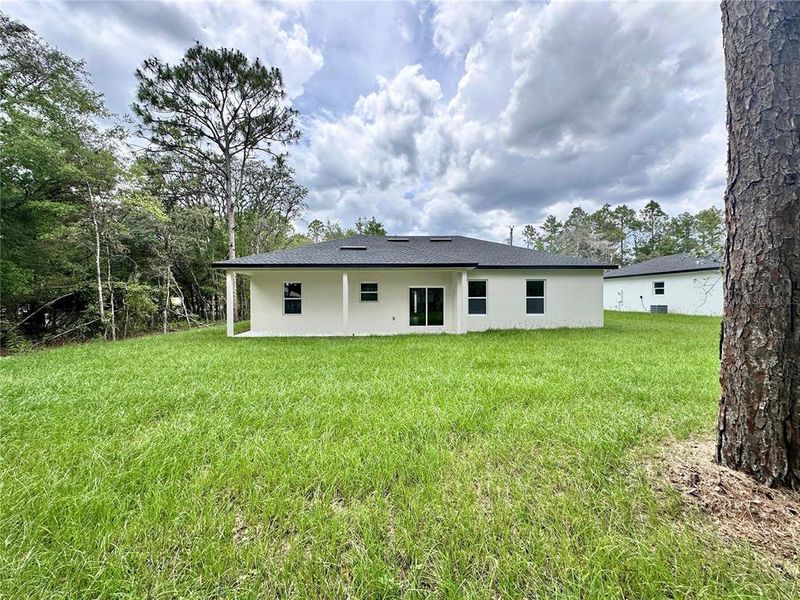 Exterior details and patio area of a home in , Citrus Springs (Image 21).