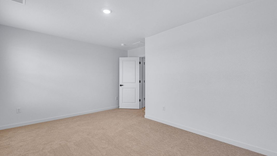 Representative unfurnished interior of a home built from the Bridgeport by D.R. Horton in Hansen Farm, Fort Collins (Image 26).