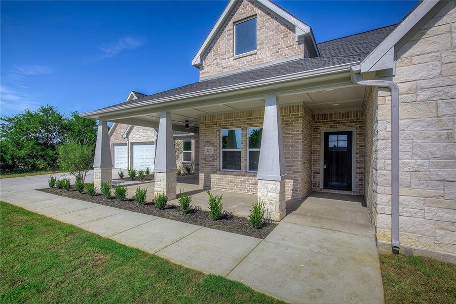 Front exterior of a new home in , Farmersville, TX, highlighting curb appeal (Image 19).