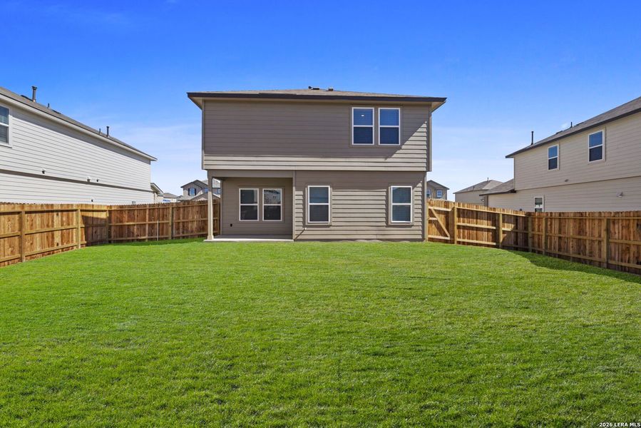 Exterior details and patio area of a home in Riverstone at Westpointe, San Antonio (Image 2).