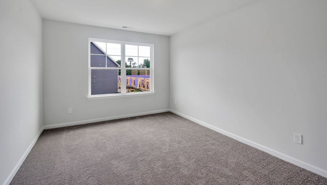 Spacious, unfurnished interior of a new home in Indigo Preserve Townhomes, Leland (Image 20).