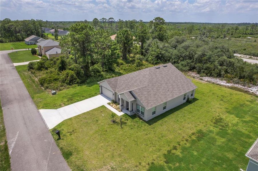 Front exterior of a new home in , Sebring, FL, highlighting curb appeal (Image 24).