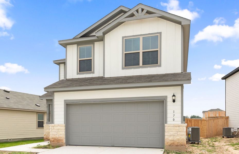 Front exterior of a new home in Sonterra, Jarrell, TX, highlighting curb appeal (Image 23). Front exterior of a new home in Sonterra, Jarrell, TX, highlighting curb appeal (Image 23).