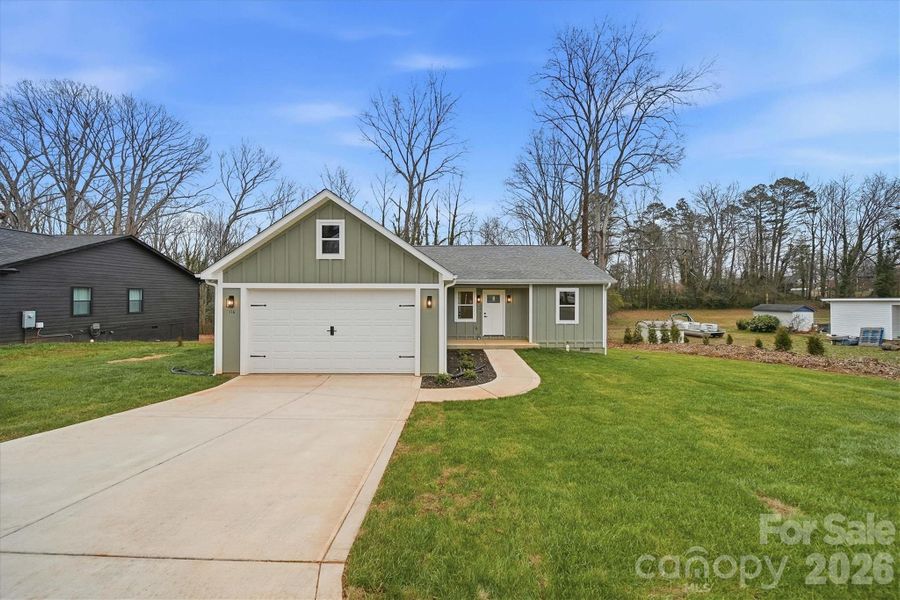 Front exterior of a new home in , Hickory, NC, highlighting curb appeal (Image 19). Front exterior of a new home in , Hickory, NC, highlighting curb appeal (Image 19).