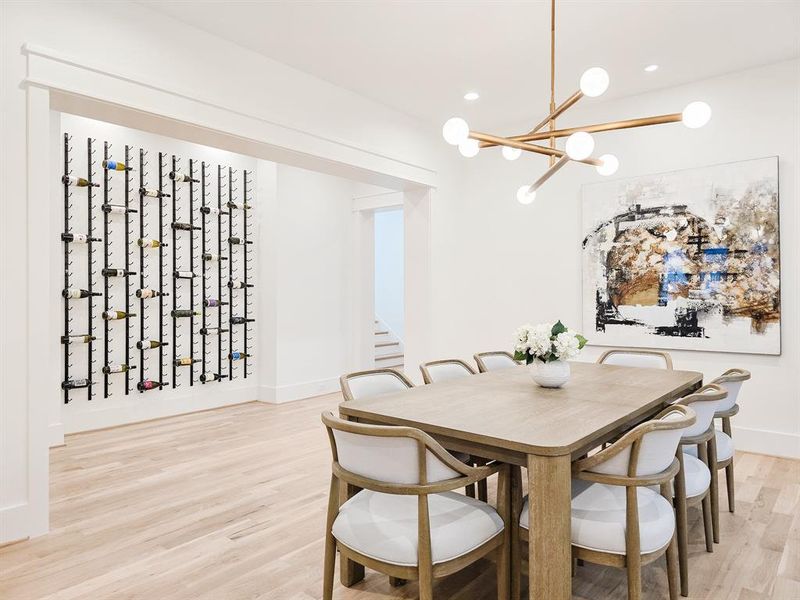 Elevate your lifestyle with this stylish and functional space, perfect for art and wine enthusiasts.