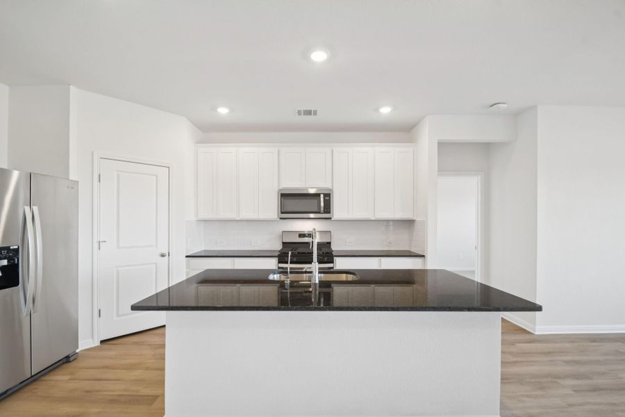 Furnished interior view inside a new home in , Conroe (Image 5).