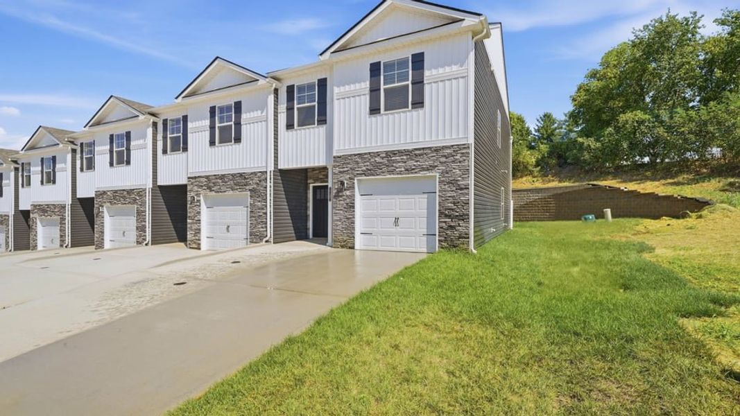 Front exterior of a new home in The Arbor Townhomes, Kingsport, TN, highlighting curb appeal (Image 2).