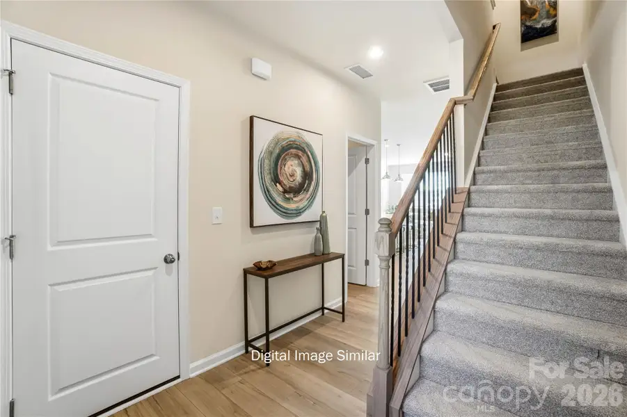 Furnished interior view inside a new home in The Townes at Cheyney, Charlotte (Image 3). Furnished interior view inside a new home in The Townes at Cheyney, Charlotte (Image 3).