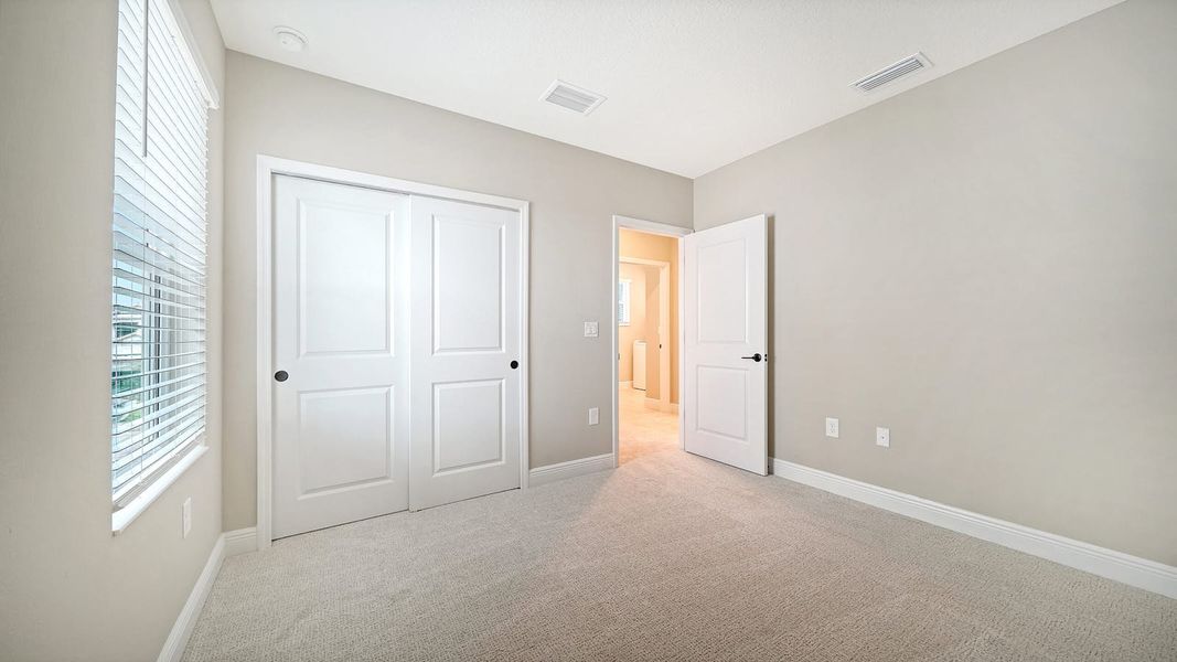 Spacious, unfurnished interior of a new home in Windward Real Estate and Homes for Sale in Sarasota, FL - Neal Communities, Lakewood Ranch (Image 45).