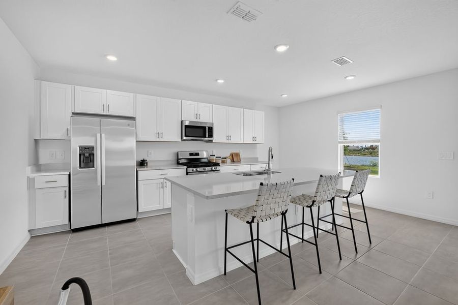 Representative furnished interior of a home built from the Redbud by Taylor Morrison in Firethorn, Parrish (Image 7).