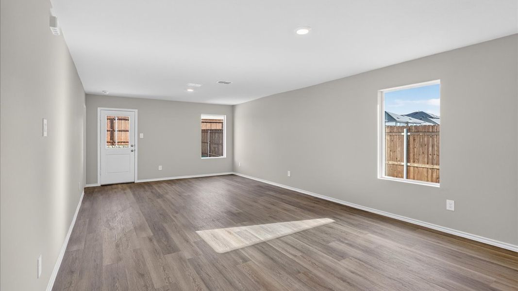 Representative unfurnished interior of a home built from the Barton by D.R. Horton in Hickory Grove, Krum (Image 7).