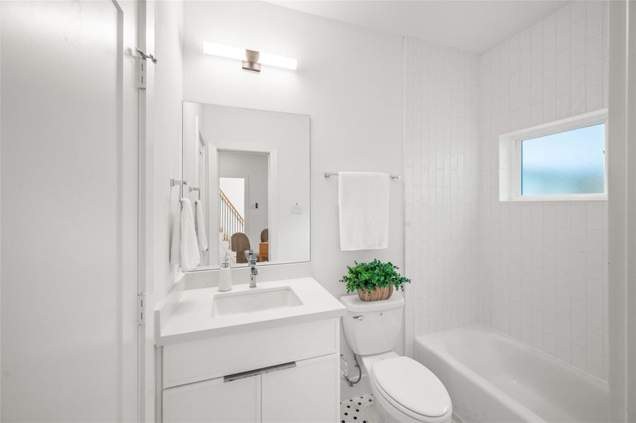 This bright and airy downstairs bathroom is perfect for guests.