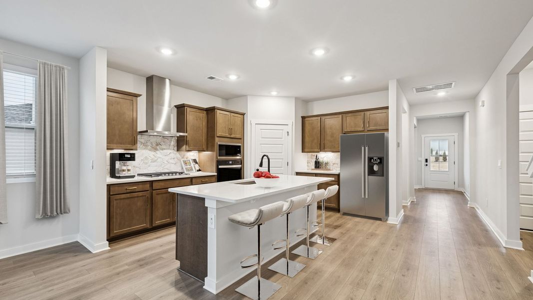Representative furnished interior of a home built from the Embry by D.R. Horton in Harvest Point, Spring Hill (Image 6).