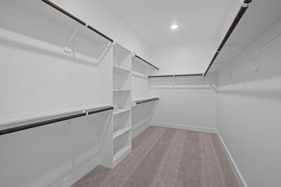 This closet is a perfect blank canvas to design a custom closet with ample hanging space, perfectly organized drawers, and chic shoe racks come together seamlessly, ensuring that everything has its place. This closet is a perfect blank canvas to design a custom closet with ample hanging space, perfectly organized drawers, and chic shoe racks come together seamlessly, ensuring that everything has its place.