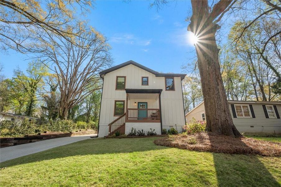 Front exterior of a new home in , Scottdale, GA, highlighting curb appeal (Image 22).