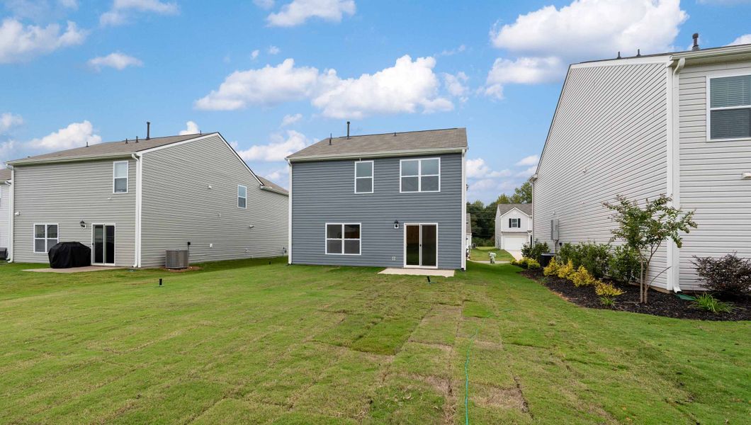 Front exterior of a new home in Harper Ridge, Roebuck, SC, highlighting curb appeal (Image 2).