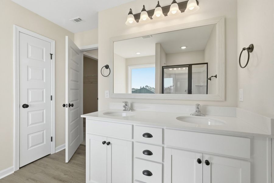 Representative furnished interior of a home built from the The Chatman by RTS Homes in The Gardens at 15 West, Hinesville (Image 18).