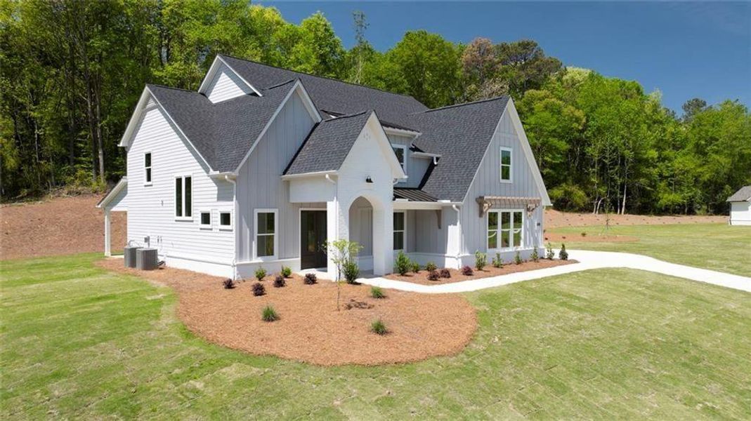 Front exterior of a new home in , Gainesville, GA, highlighting curb appeal (Image 29).