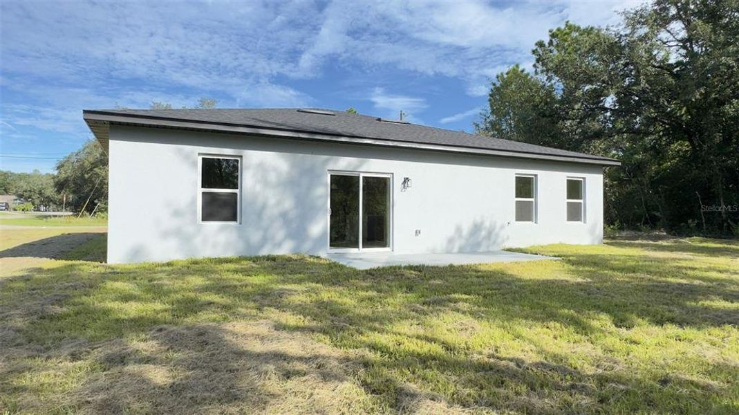 Front exterior of a new home in , Dunnellon, FL, highlighting curb appeal (Image 16).