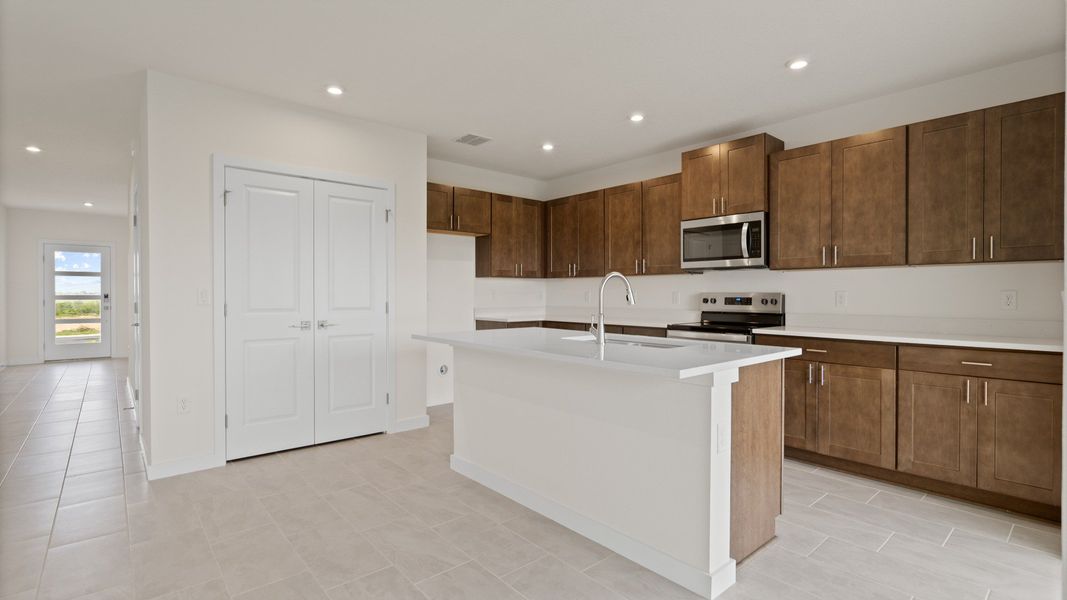 The Atwood Kitchen by DRB Homes in Hamilton Bluff, Haines City, FL The Atwood Kitchen by DRB Homes in Hamilton Bluff, Haines City, FL