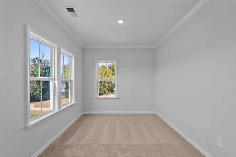 Spacious, unfurnished interior of a new home in Lilah Grove, Summerfield (Image 40).