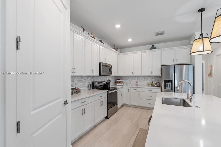 Furnished interior view inside a new home in Del Webb Naples, Ave Maria (Image 9).