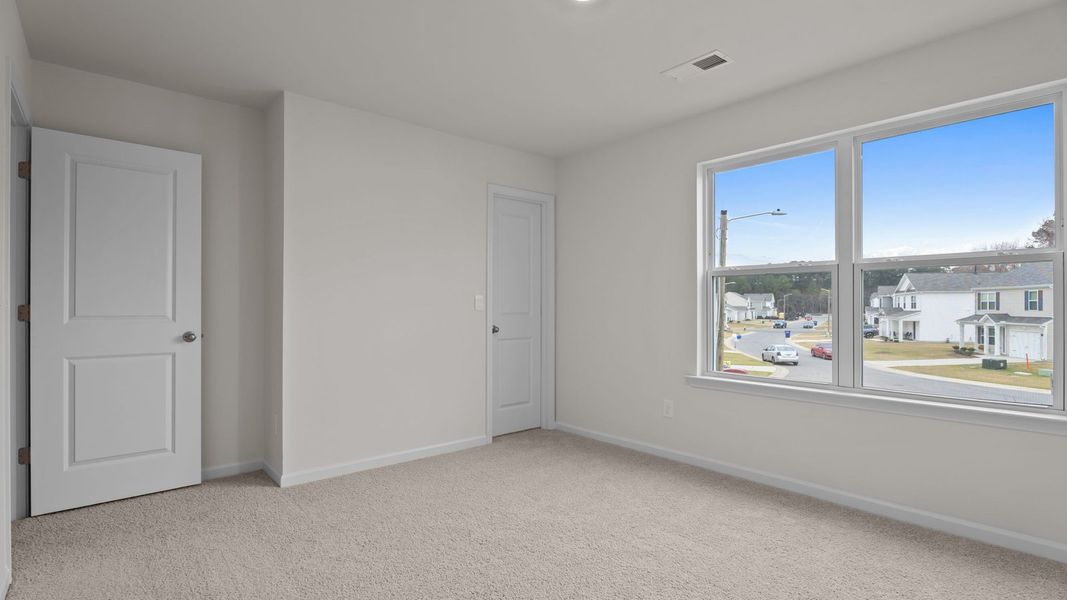 Spacious, unfurnished interior of a new home in Jetstream Park, Wilson (Image 21). Spacious, unfurnished interior of a new home in Jetstream Park, Wilson (Image 21).
