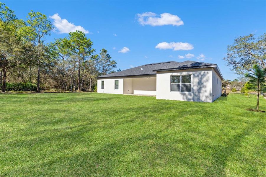 Exterior details and patio area of a home in , Brooksville (Image 31).