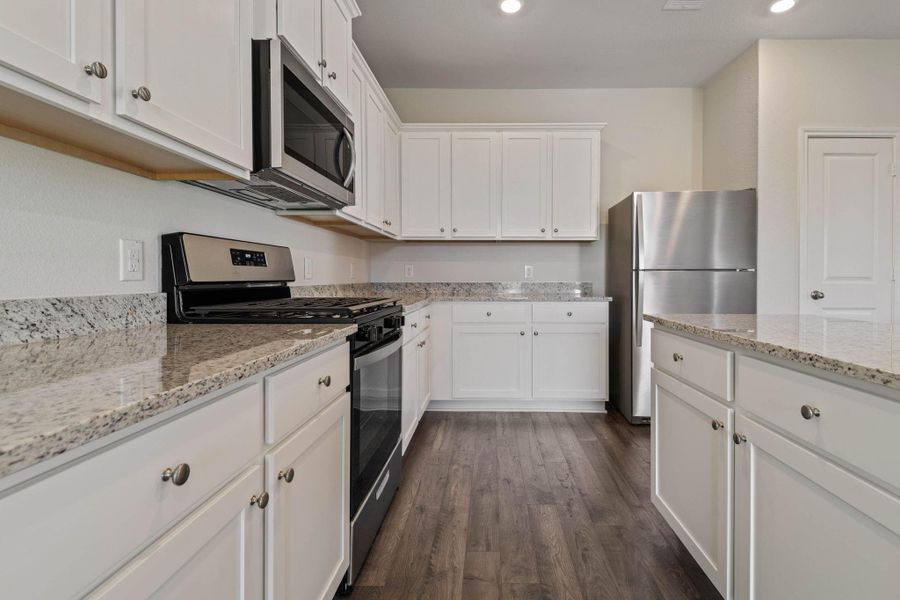Furnished interior view inside a new home in Sweetwater Ridge, Conroe (Image 6).