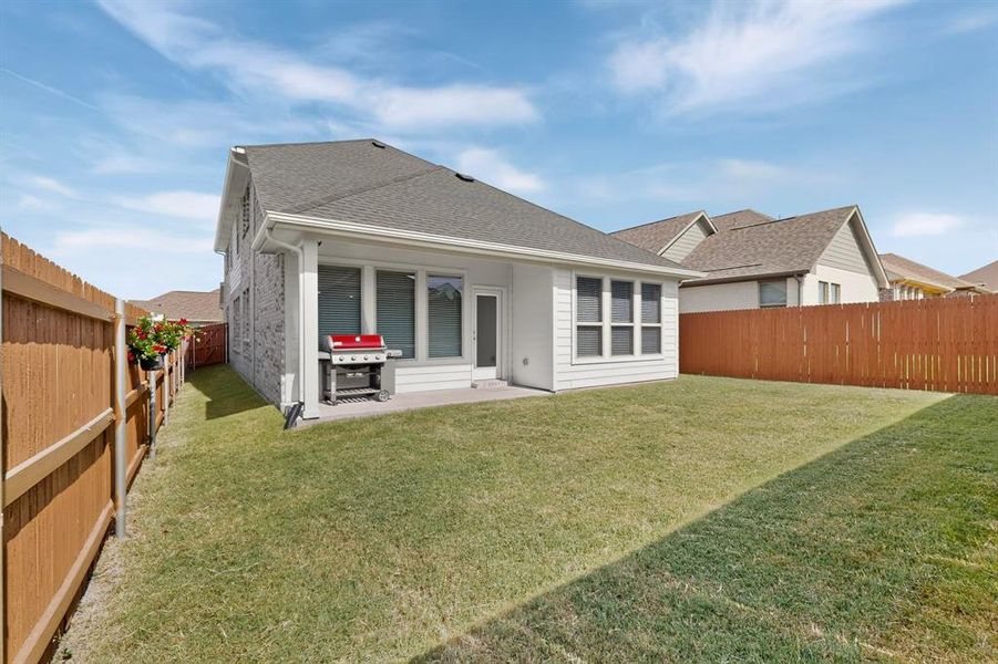 Exterior details and patio area of a home in Heartland, Heartland (Image 3).