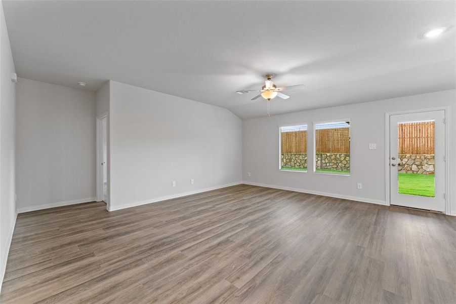 Empty room featuring ceiling fan and wood finished floors Empty room featuring ceiling fan and wood finished floors