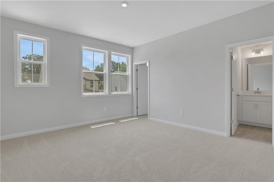 Spacious, unfurnished interior of a new home in The Paddocks at Doc Hughes, Buford (Image 32).