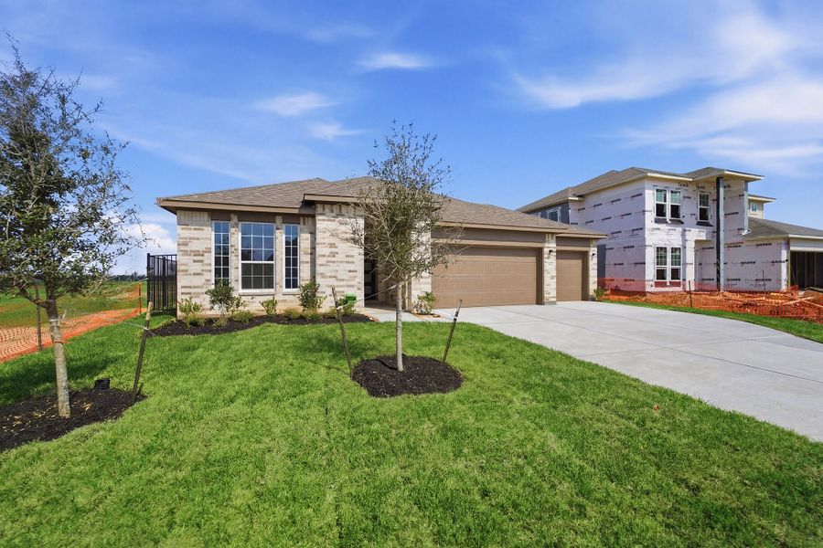 Front exterior of a new home in Canterra Creek, Rosharon, TX, highlighting curb appeal (Image 25).
