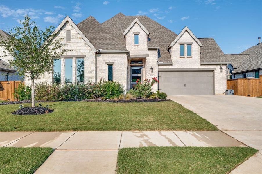 Front exterior of a new home in , Haslet, TX, highlighting curb appeal (Image 2).