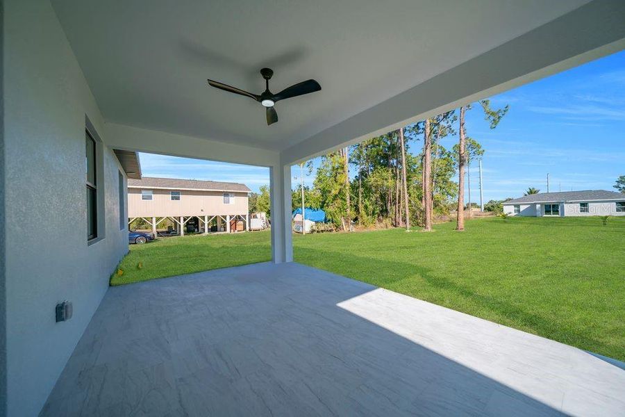 Exterior details and patio area of a home in , Lehigh Acres (Image 4).
